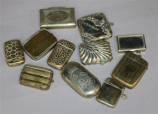 Eleven brass vestas, various